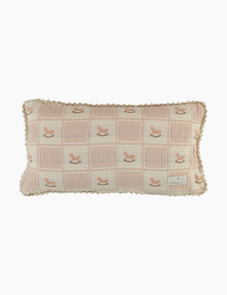 Image of a rocking horse patchwork pillowcase on a white background.