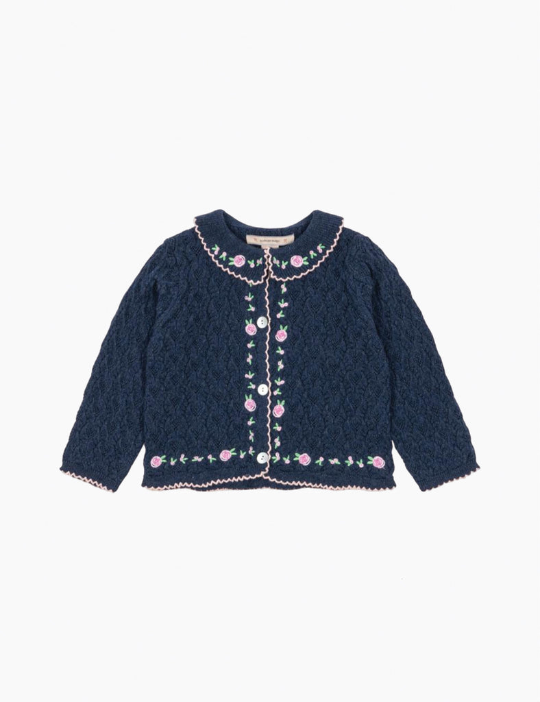 Navy blue knitted cardigan with floral embroidery on a white background