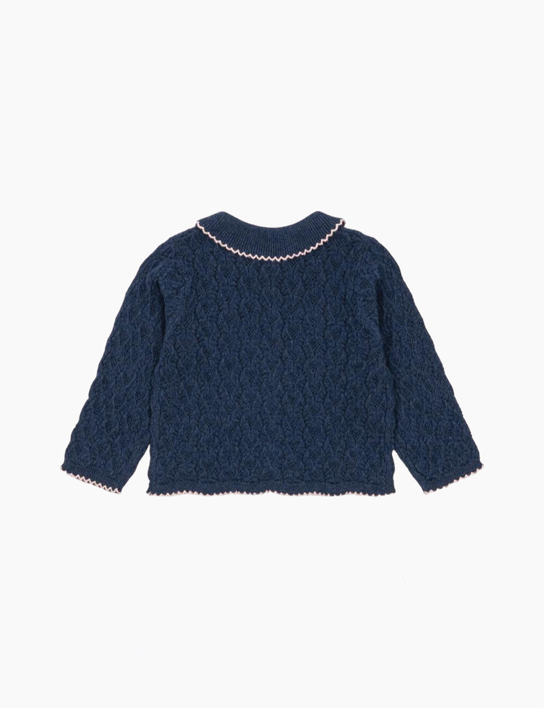 Navy blue knitted sweater on a white background