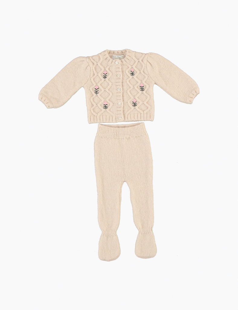 Beige knitted baby outfit with a cardigan and pants on a white background