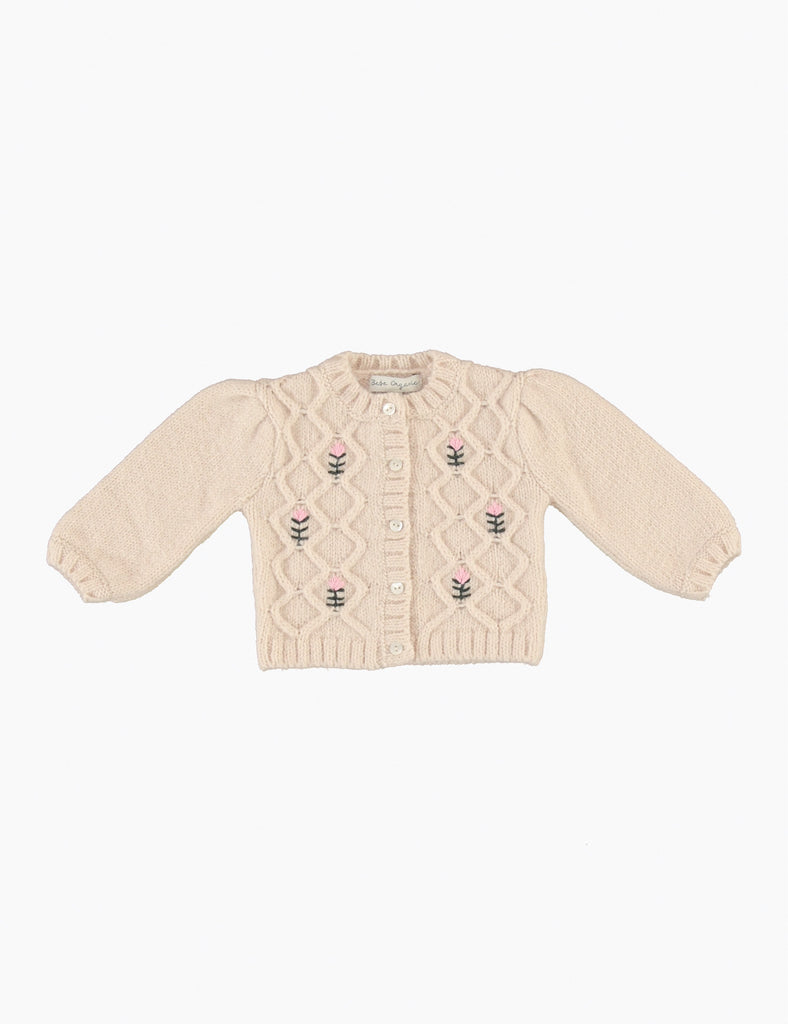 Beige baby cardigan with floral patterns on a white background