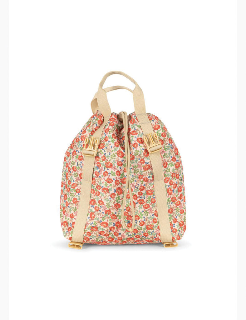 Floral patterned backpack with beige straps on a white background