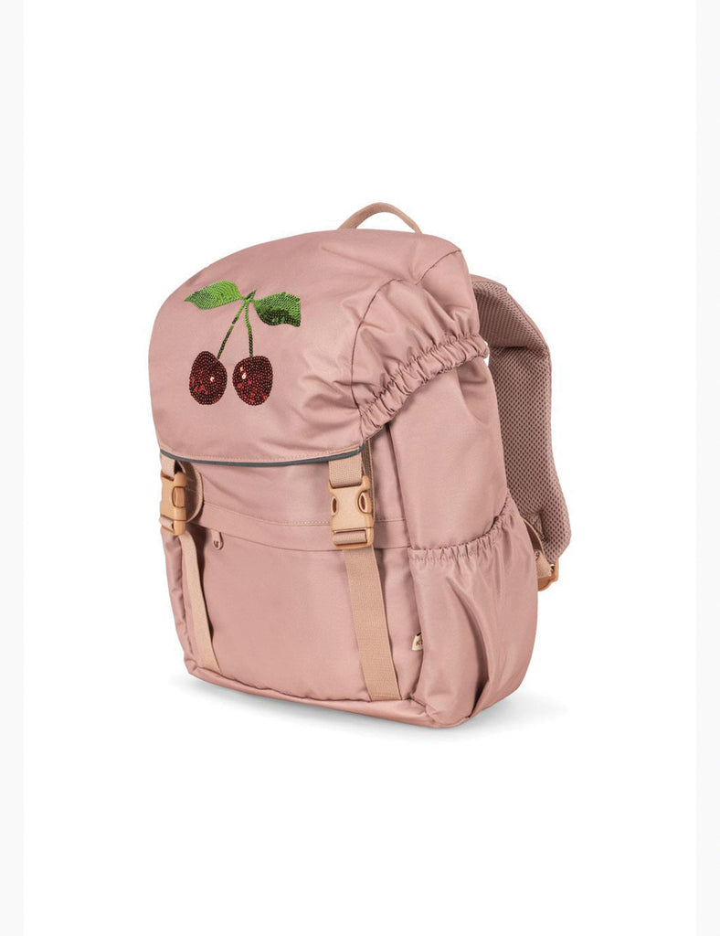 Pink backpack with cherry design on a white background