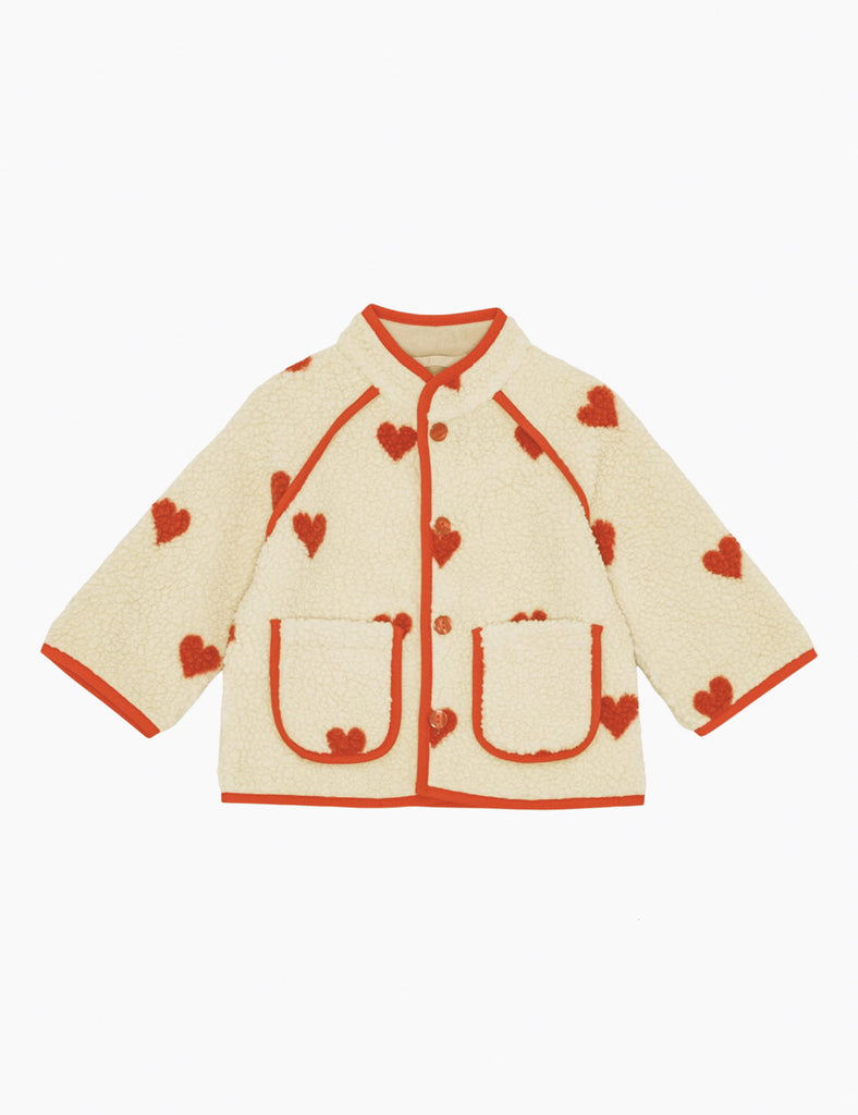 Children's jacket with heart patterns on a white background