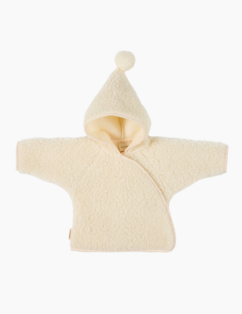 Cream-colored baby jacket with hood on a white background