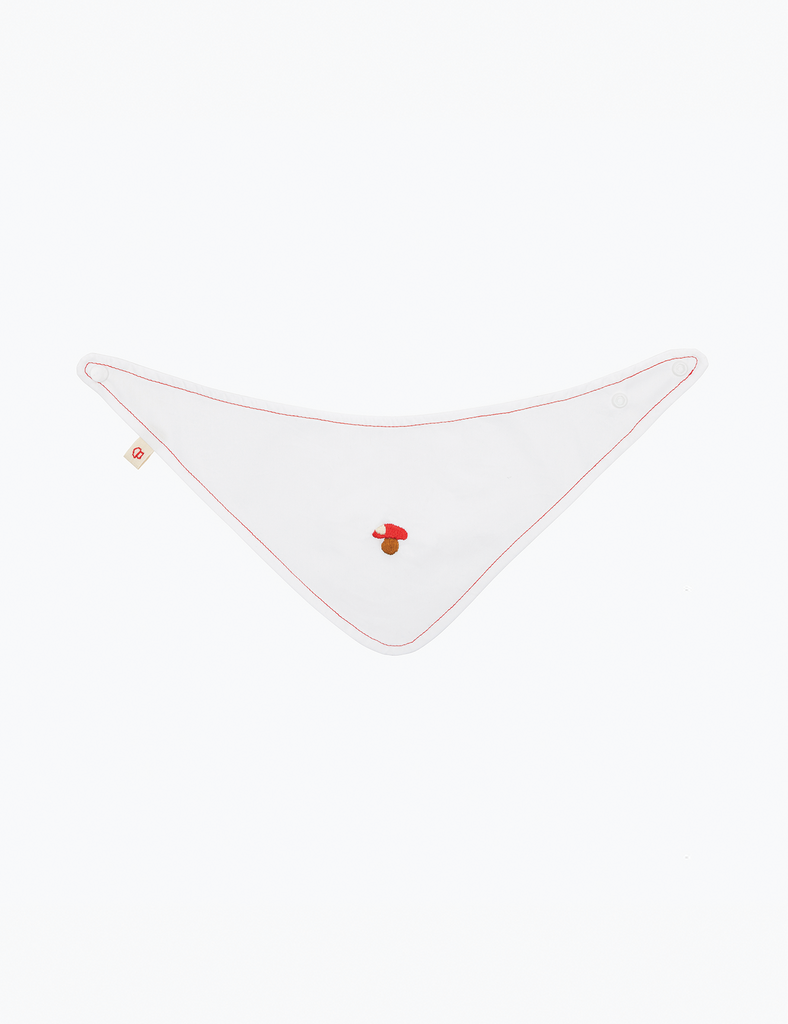 White triangle-shaped napkin with red floral design on a white background