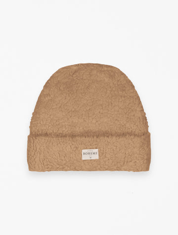 Shearling Beanie in Golden Bear flat lay image.
