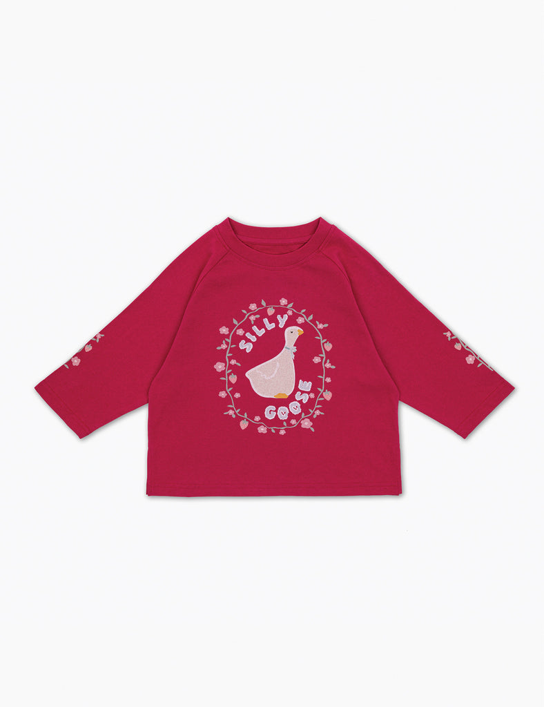 Red long-sleeve shirt with a white graphic design on a white background