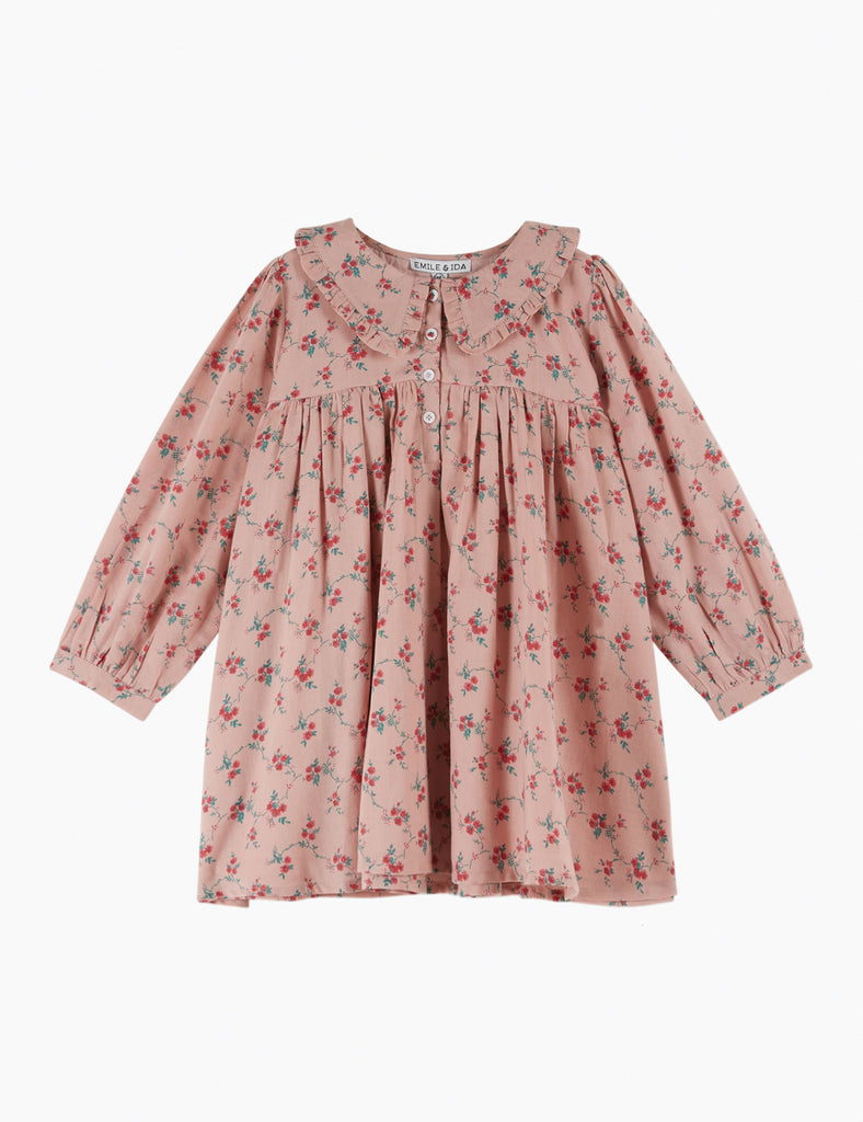 Pink floral dress on a white background
