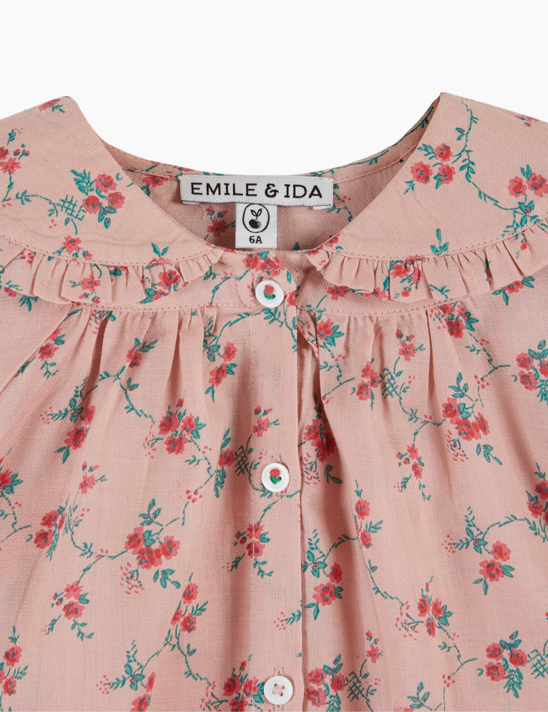 Floral dress with 'Emile & Ida' label on a white background