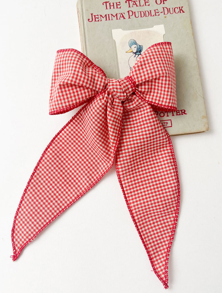 Image of Storybook Bow in Tomato.