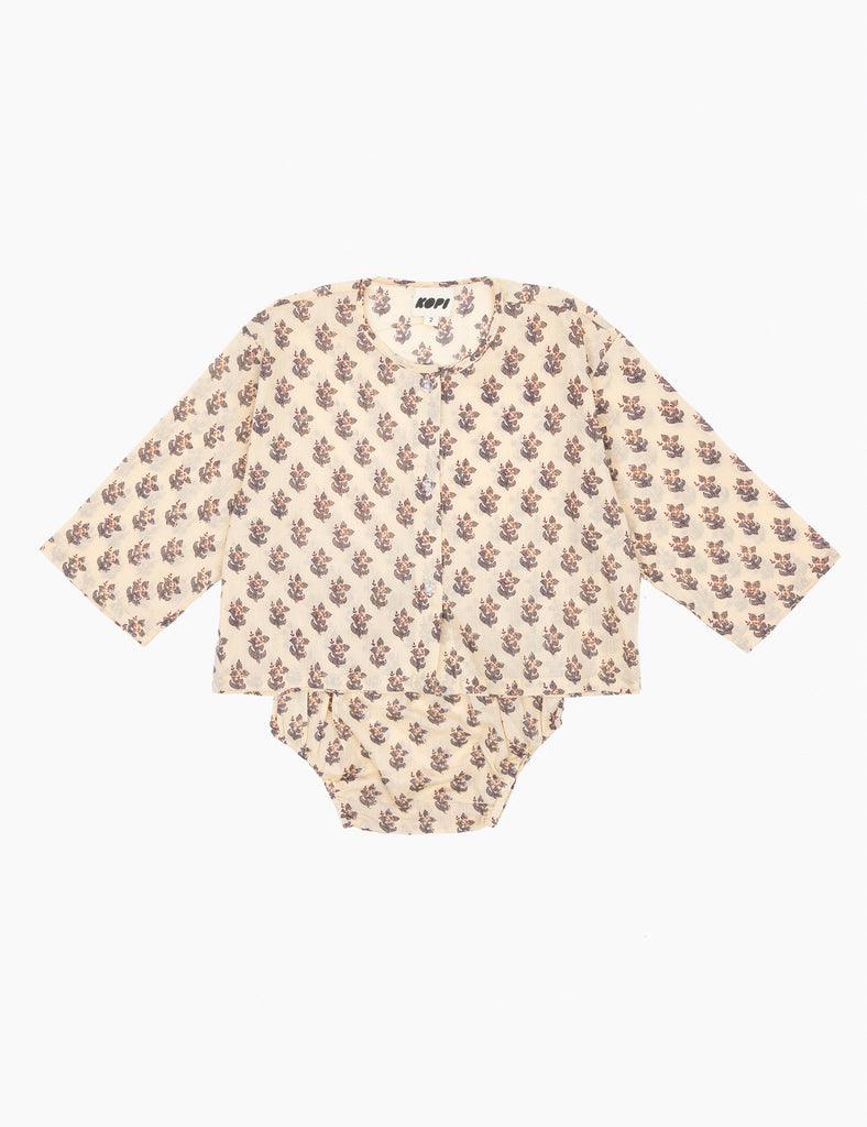 Floral patterned baby set on a white background