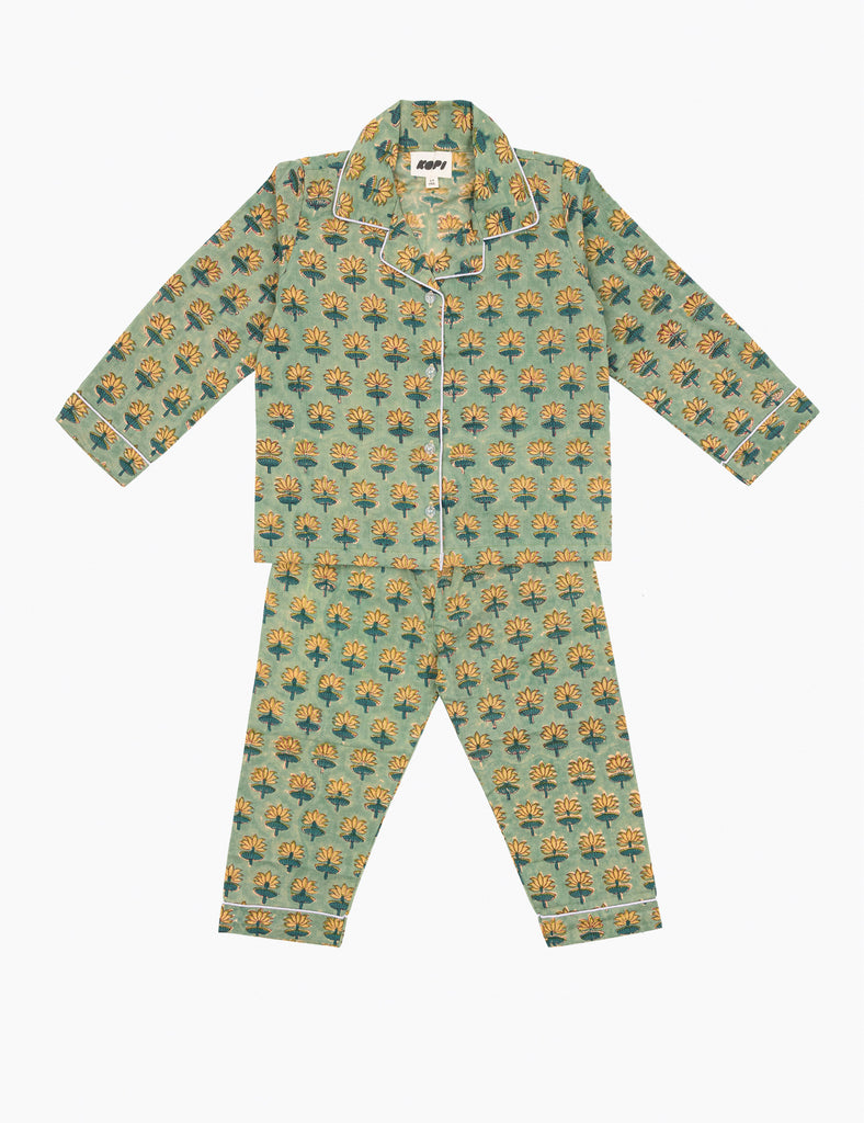 Children's pajama set with block print pattern on a white background