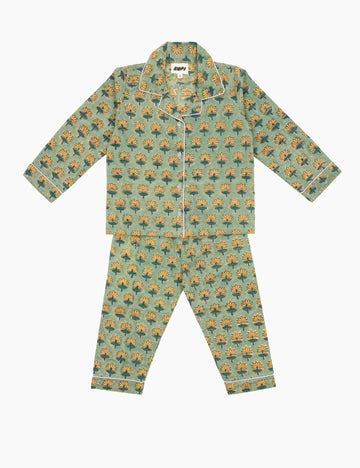 Children's pajama set with block print pattern on a white background