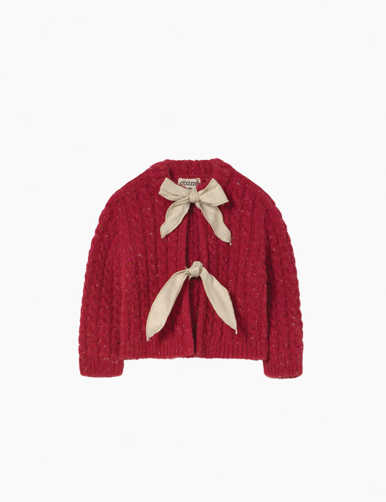 Red sweater with beige ribbons on a white background