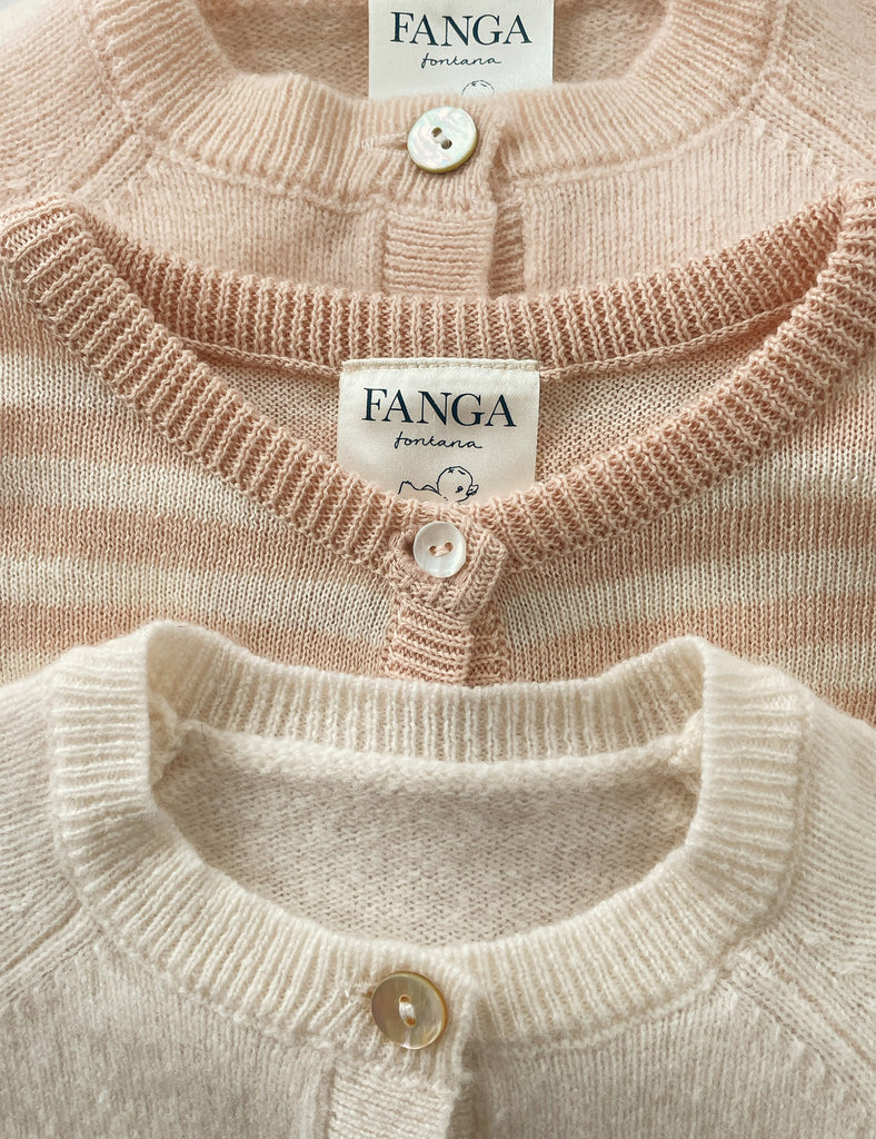 Close up of striped baby cardigans