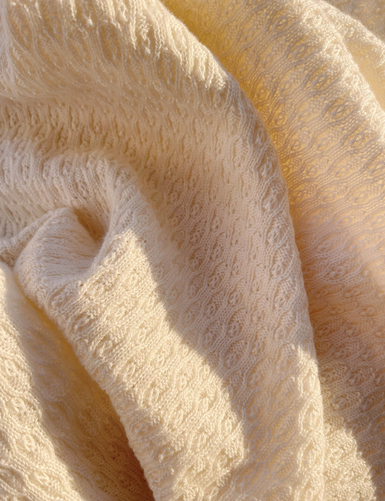 Close-up of textured beige fabric