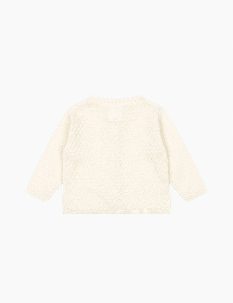 Beige sweater on a white background