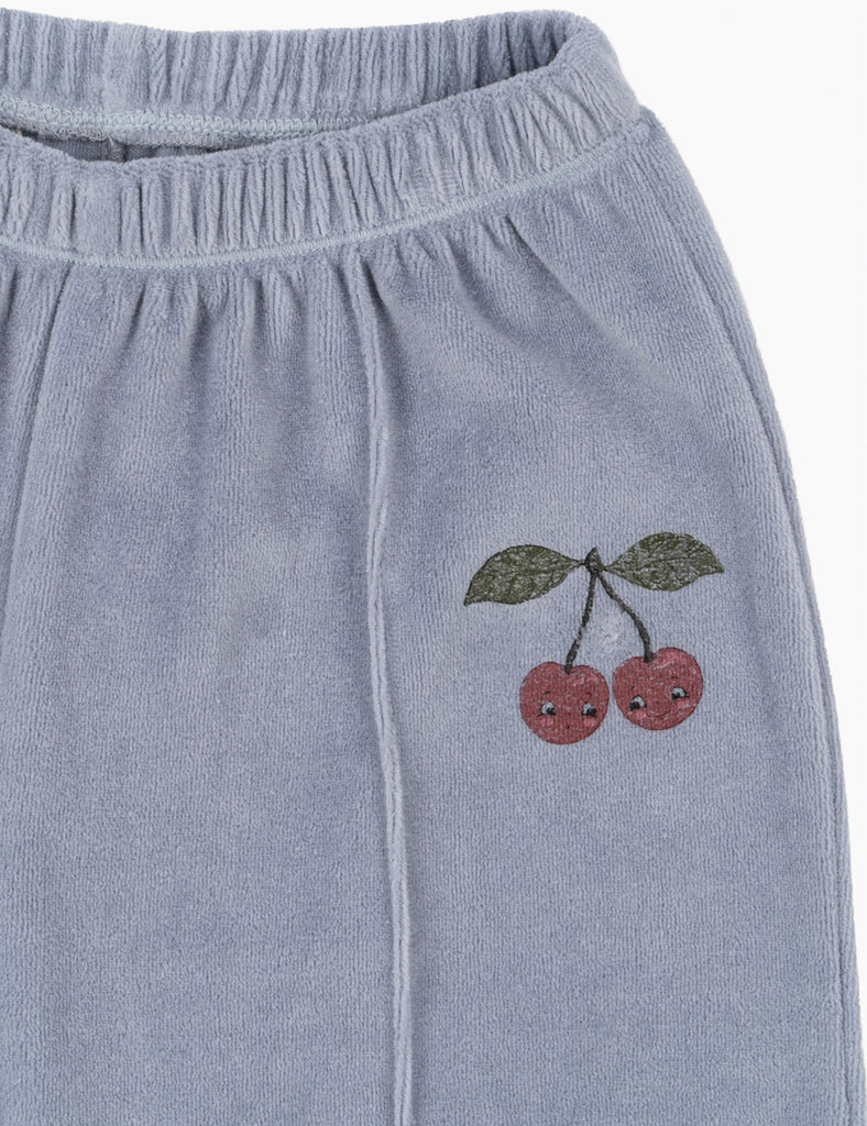 Gray pants with embroidered cherries on a white background