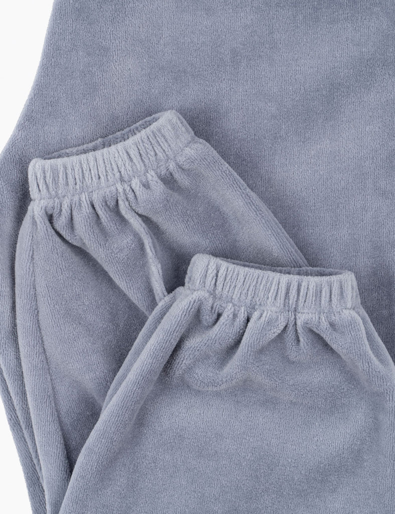 Close-up of gray sweatpants with a soft texture.