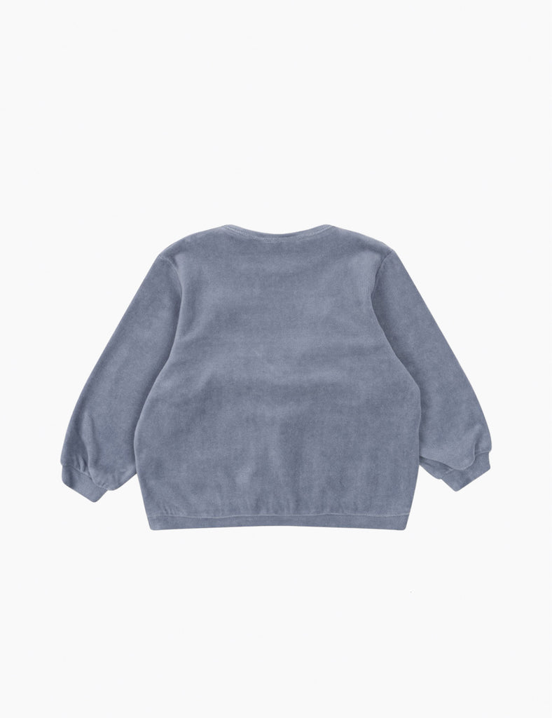 Back view of a gray sweater on a white background