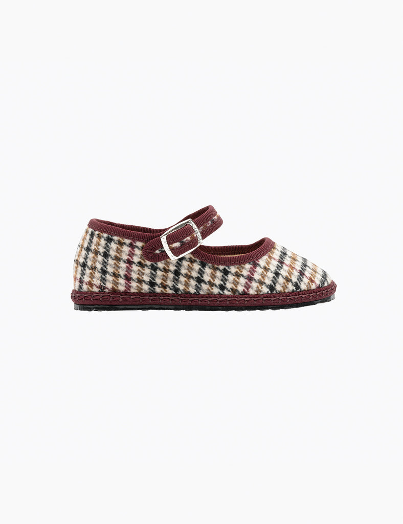 Plaid shoe with a buckle on a white background