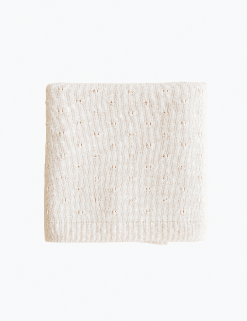 Beige textured fabric swatch on a white background