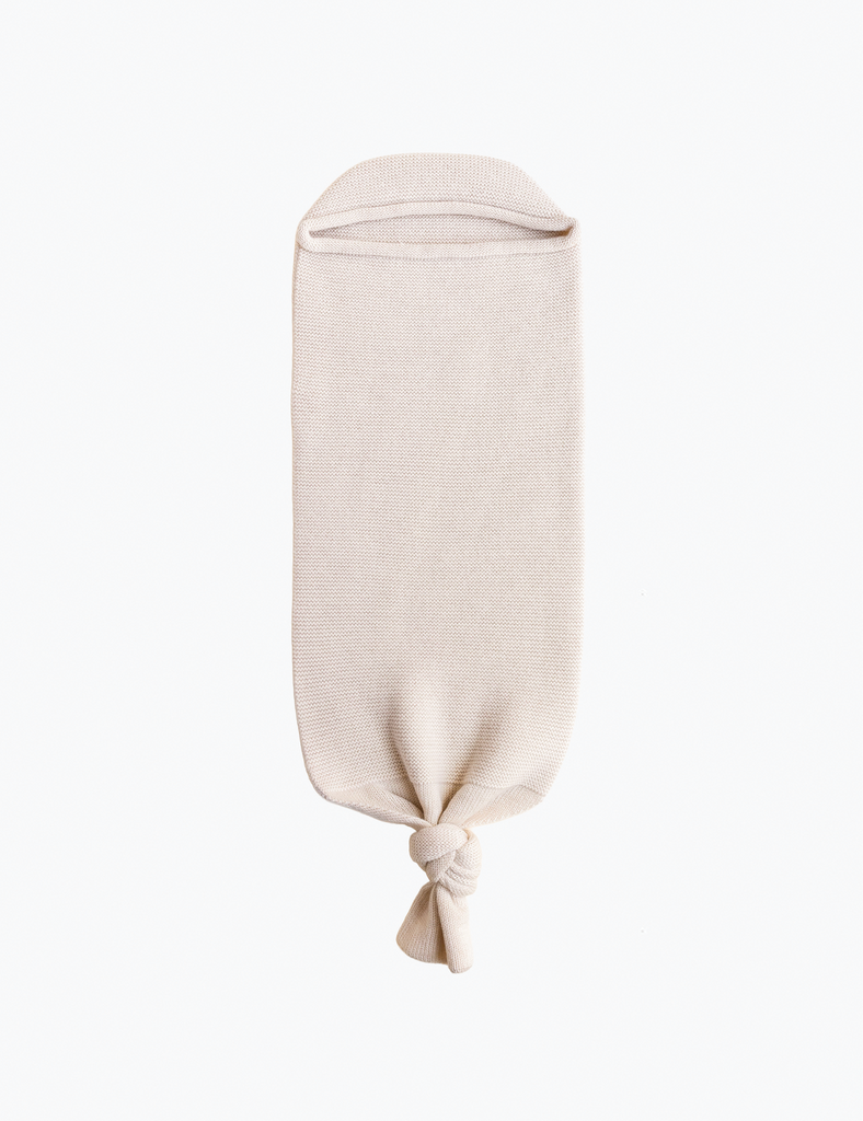 Image of knitted cocoon in cream