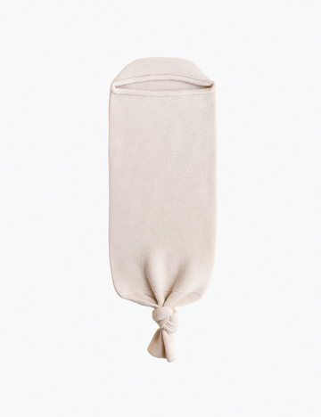 Image of knitted cocoon in cream
