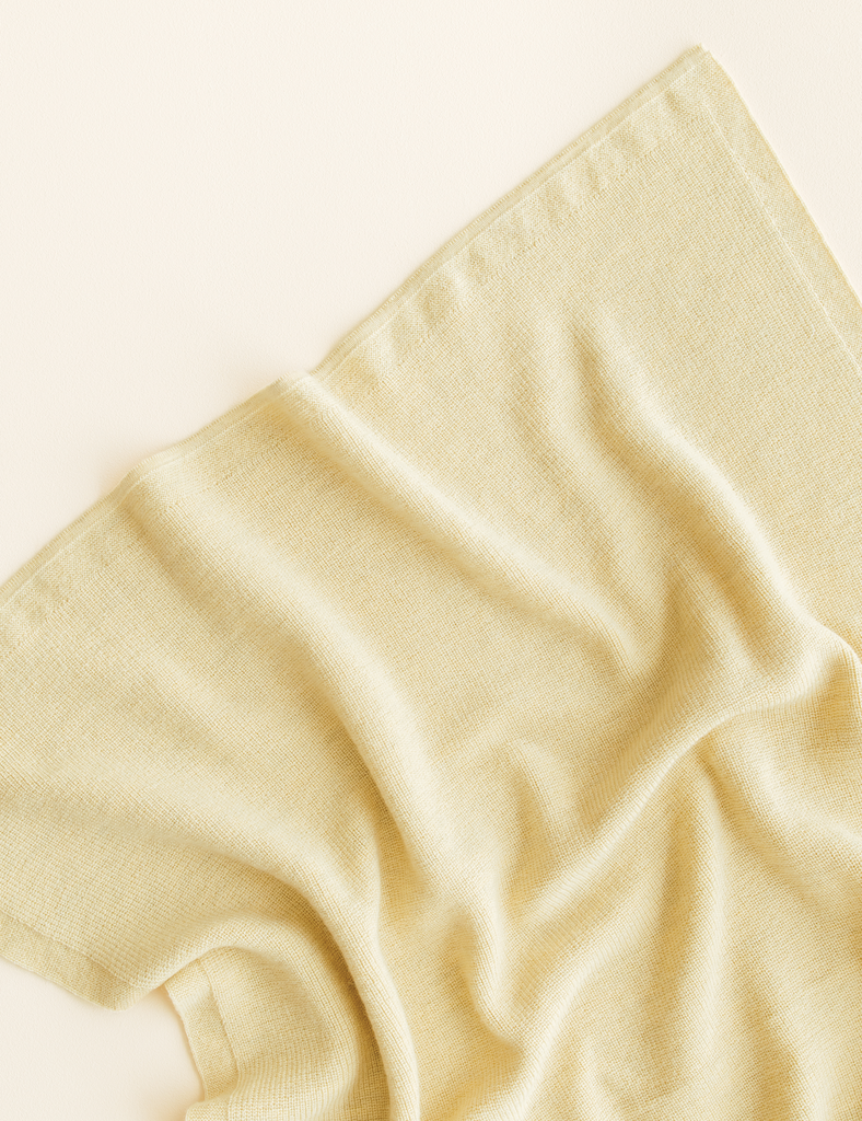 Yellow knitted blanket