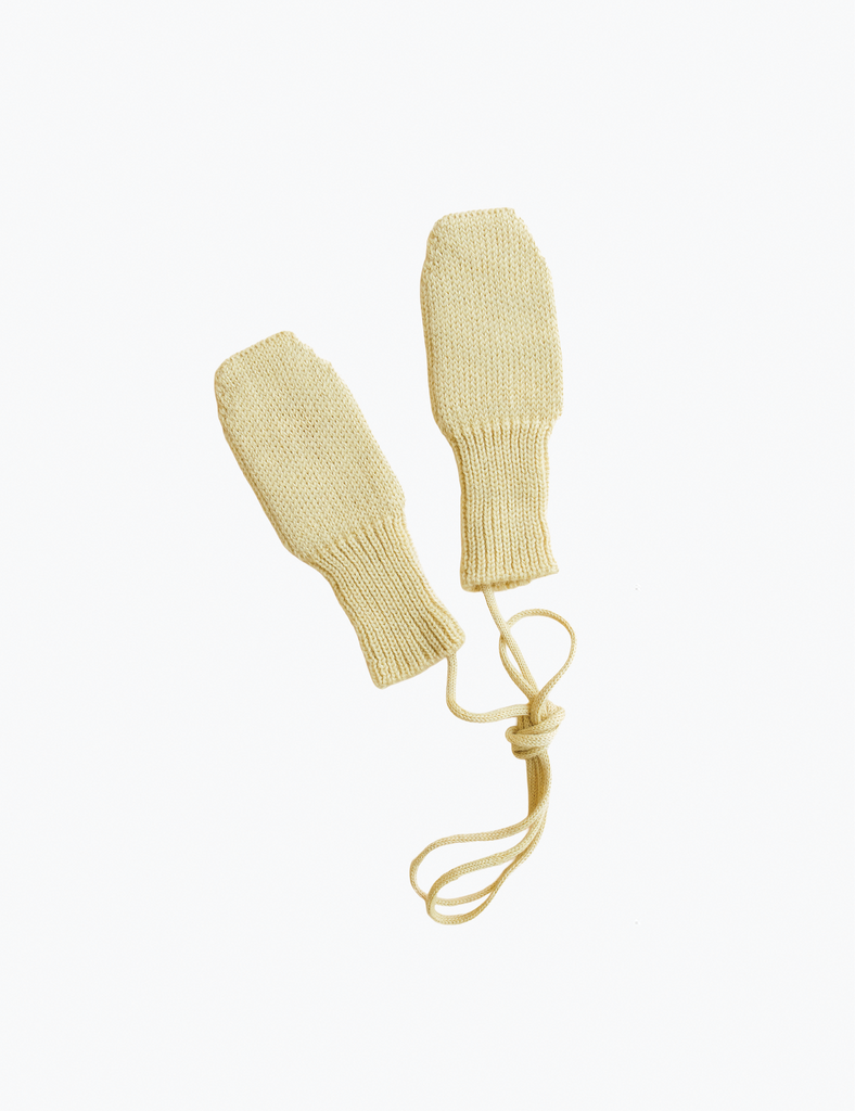 Pair of yellow knitted mittens on a white background