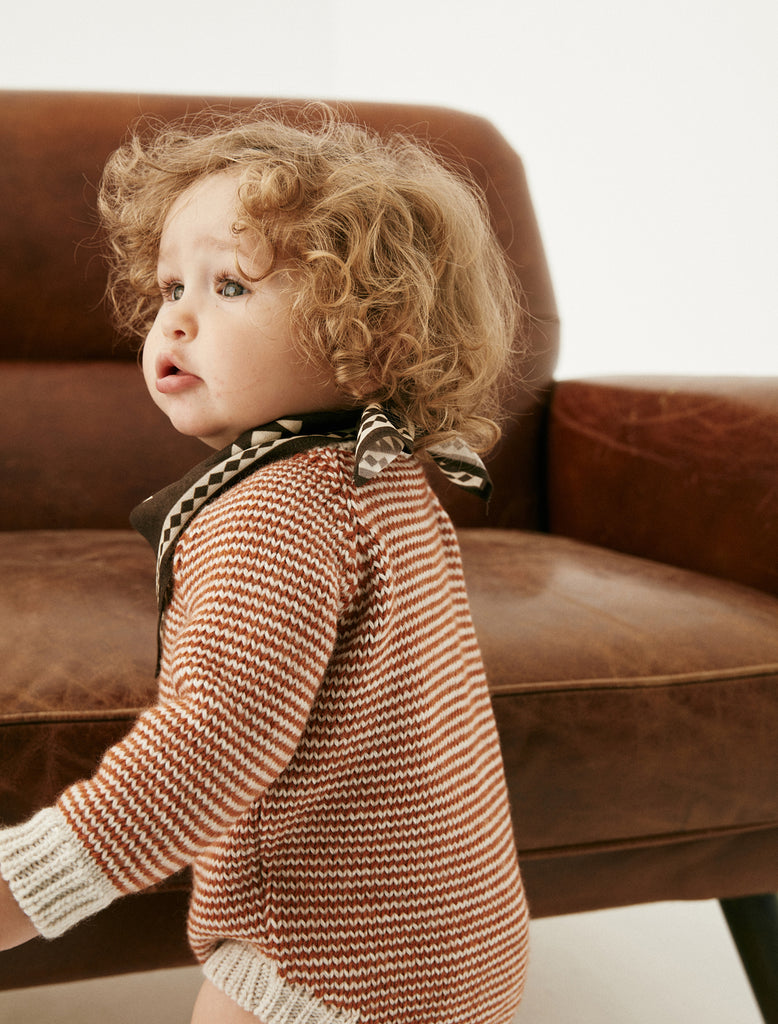 Alas de Rayas Sweater Knit Onesie in Clay on baby model