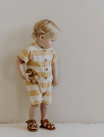 Short Sleeve Romper in Yellow Stripe lifestyle image.